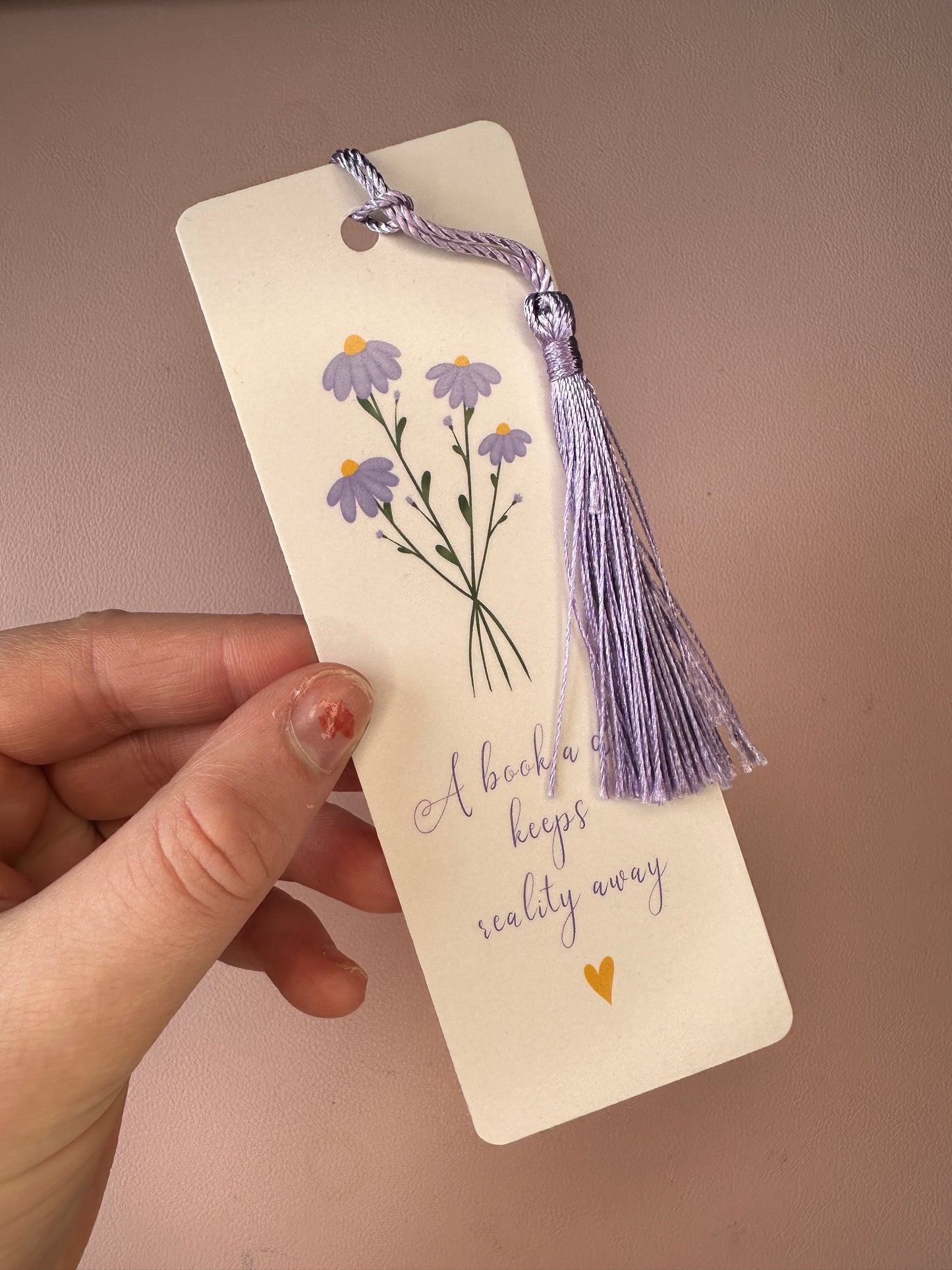 'A book a day keeps reality away' Bookmark