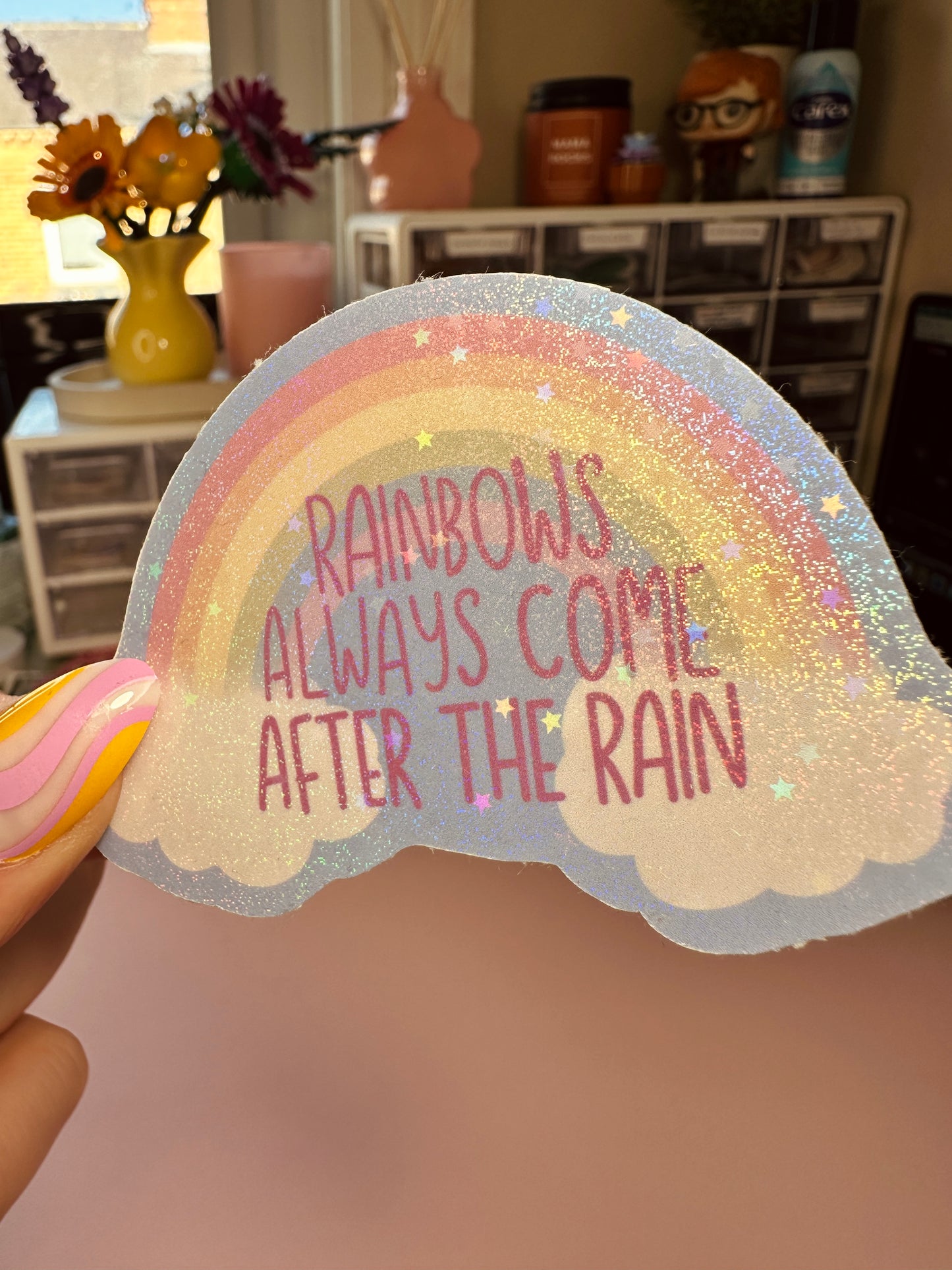 'Rainbows always come after the rain' sticker