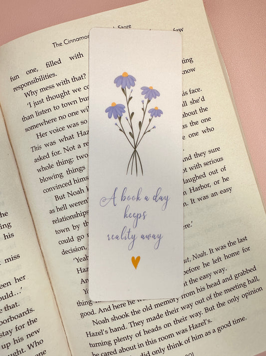'A book a day keeps reality away' Bookmark