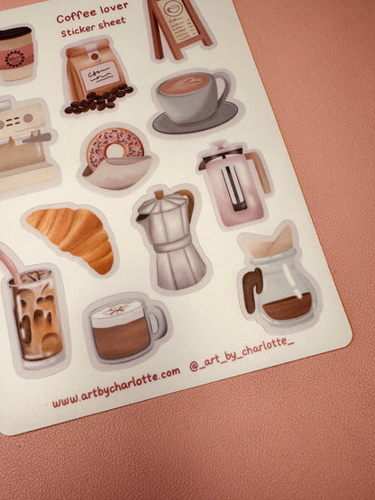 Sheet of coffee-themed stickers with various coffee-related items on a pink background.