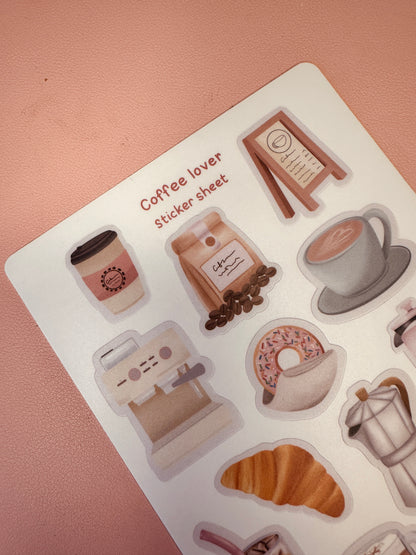 Coffee-themed sticker sheet with various coffee-related illustrations on a pink background