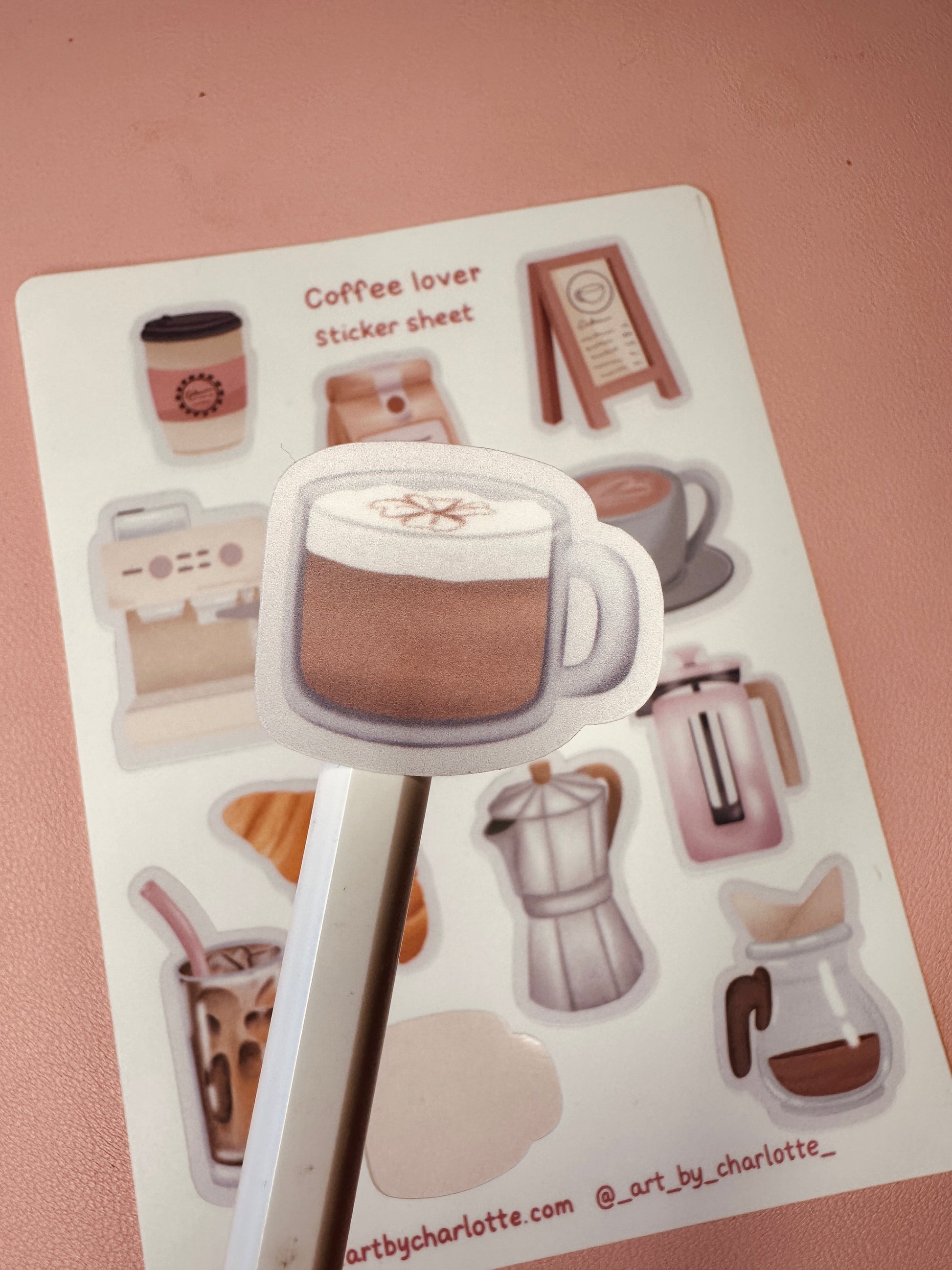 Coffee-themed sticker sheet with various coffee-related illustrations on a pink background.